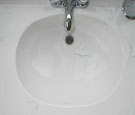Oval rimless integral bowl